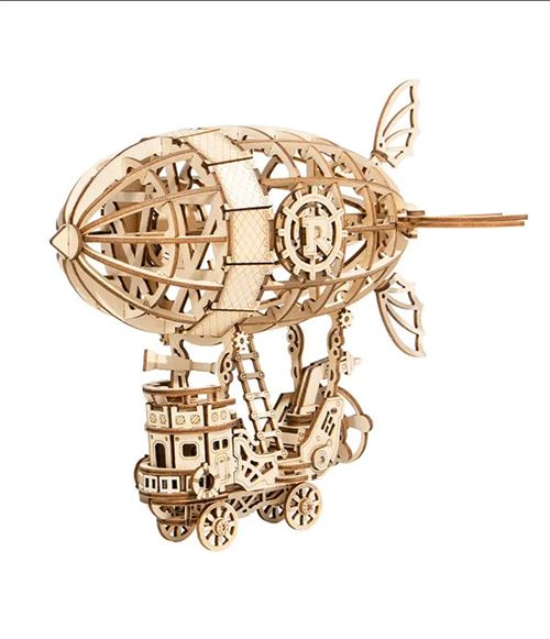Maquette en bois dirigeable aux lignes aériennes, pensée comme puzzle 3D